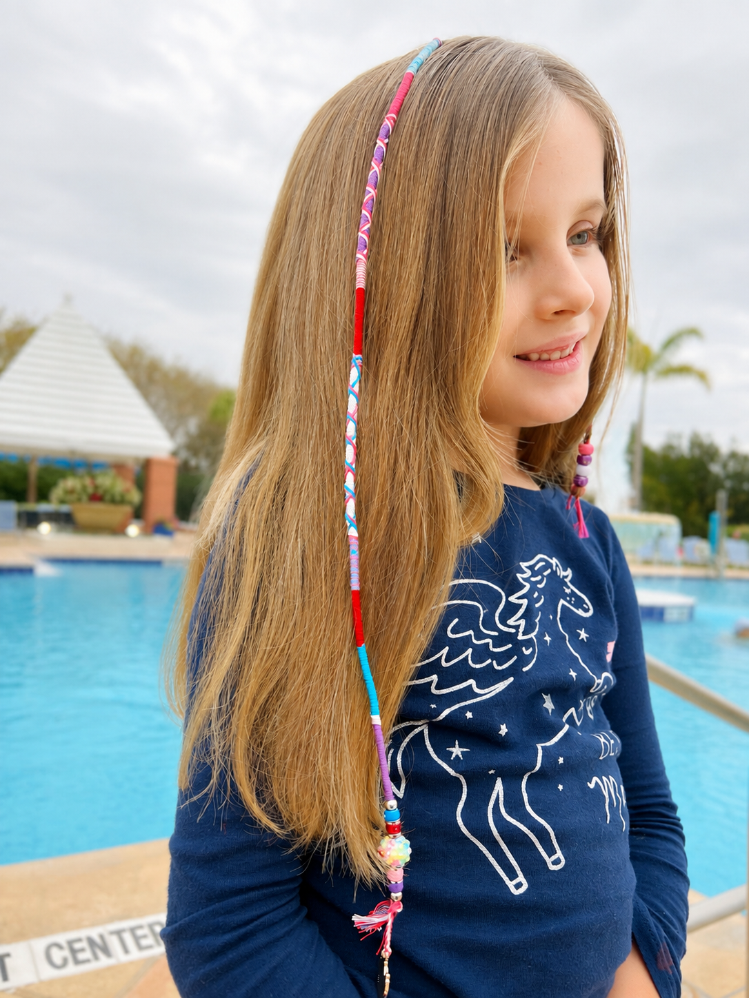 Hair Wraps. Brena's Arts & Activities family recreation experience at a resort
